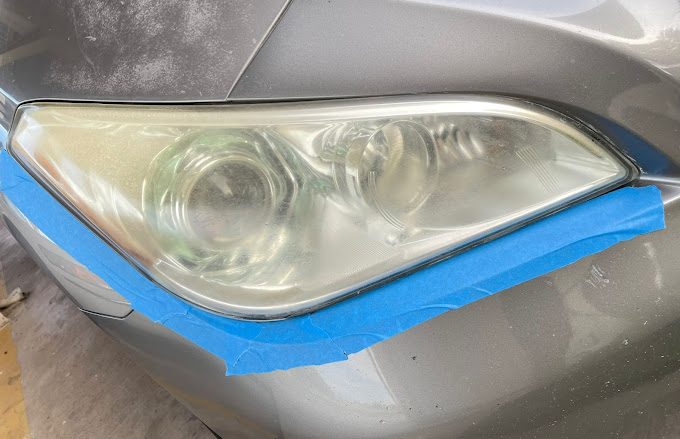 Headlight restoration in McAllen by OptiGlass+ — before
