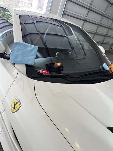 Windshield replacement on a white Ferrari in McAllen by OptiGlass+